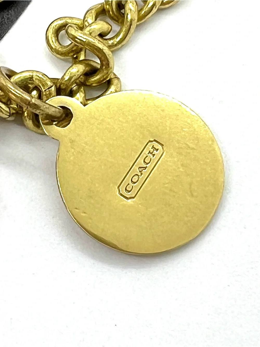 Coach Gold Tone Charm Bracelet with Carriage Charms